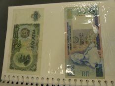 Over 60 used world bank notes and postal orders etc to include UK, China, USA, Germany, Jamaica etc,