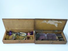 Two cased sets of 19thC travelling beam scales,