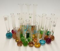 Approximately 30 Bohemian coloured glass bud vases