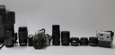 A quantity of cameras and accessories including Canon EOS 3000, Sigma 400mm 1:5.