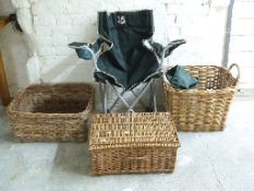 Two wicker log baskets and picnic basket and a camping chair