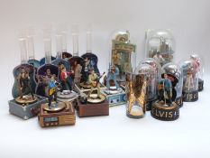 A collection of Elvis Presley Franklin Mint figures with certificates