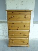 Modern pine chest of four drawers,