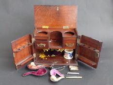 Carved oak smoker's cabinet with lift up lid,