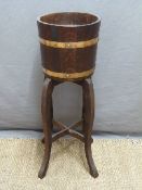 A coopered Lister jardiniere on stand,