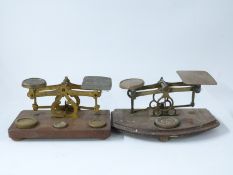 Two sets of brass postage scales