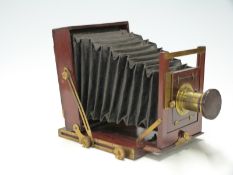 Mahogany and brass half plate camera