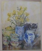 Linda Winter watercolour curious cat with jug, daffodils and teaset, signed lower right,