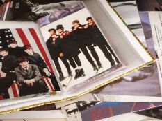 A quantity of Beatles pictures and postcards suitable for framing,