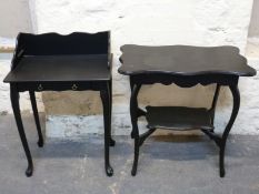 A small ebonised desk and a side table,