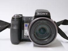 Sony DCS-H7 digital camera with charger etc