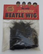 Beatles 'The Only Authentic Beatle Wig' fits all head sizes,