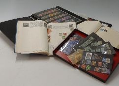 An album of mainly USA stamps with some early examples together with four albums and stockbooks of