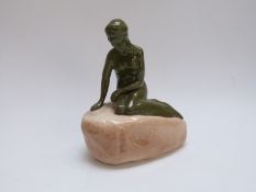 Carlsberg ceramic figure of a lady on a rock,