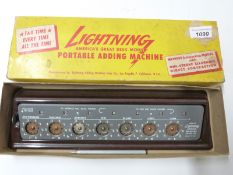 Lightning bakelite portable adding machine in original box with instructions