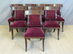 Set of eight empire style mahogany upholstered dining chairs