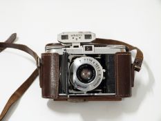 Voightlander folding camera and a Watameter II