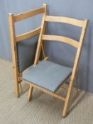 A pair of folding chairs