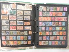 A ring binder of early continental European stamps