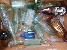A collection of glass bottles including poison,
