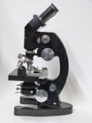 CTS tabletop stereoscopic microscope in mahogany case