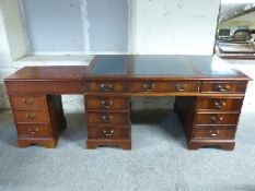 Leather inset twin pedestal desk with three drawers to top and three to each pedestal,