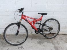 Trax red mountain bike with full suspension