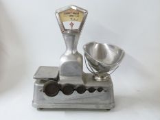 Vandome & Hart Ltd London aluminium shop scales with rack of Crane weights