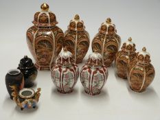 A collection of Japanese lidded vases