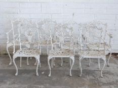 Seven metal garden chairs