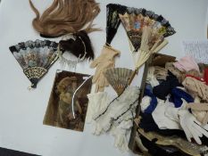 A large collection of vintage handbags, gloves,