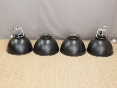 Four industrial style lamps,