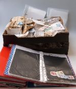 A large quantity of loose all-world stamps and sundries