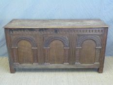 Carved oak panelled coffer,