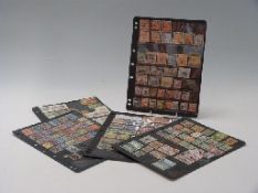 A selection of Middle East stamps on sheets including Egypt, Kuwait, Sudan,