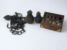 A steelyard type scale together with a cased set of gram weights