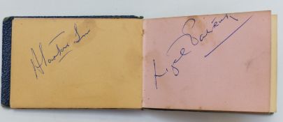 A miniature autograph album with signatures for Gregory Peck,