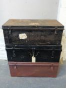 Three vintage metal steamer or travelling trunks, some with shipping line labels,