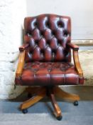 Leather upholstered captain's chair