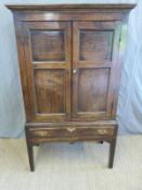 18thC/ 19thC oak two door housekeeper's cupboard on stand with dummy drawer,