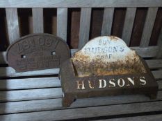 A cast iron Hudson's Soap dog water bowl with 'Drink Puppy Drink' to the sides,