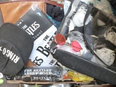 A collection of Beatles decorated textile items to include t-shirts, bed linen, handbags,