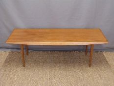 Gordon Russell of Broadway retro teak coffee table with broad bevelled edges raised on slim