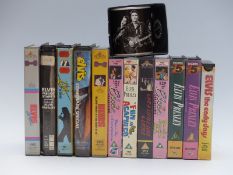 A large collection of Elvis Presley novelty items including Monopoly,