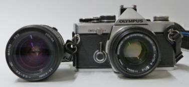 Olympus OM2N SLR camera with 1:1.8 f=50mm lens, Cosina 28-80mm 1:3.5 - 5.