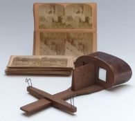 A stereoscopic viewer and cards including USA, the miners ships Colorado, New York elevated Railway,