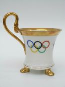 Hutschenreuther 1936 Olympics commemorative footed cup with gilded loop handles