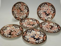 Seven Crown Derby dinner plates in 383 pattern with Mortlock's backstamp