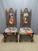 A pair of 19thC carved and turned oak throne chairs with upholstered seats and back splats