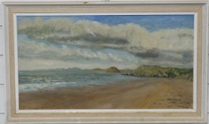 J A Cotterill oil on canvas 'Criccieth from Black Rock Sands' signed and dated 1985 lower right and